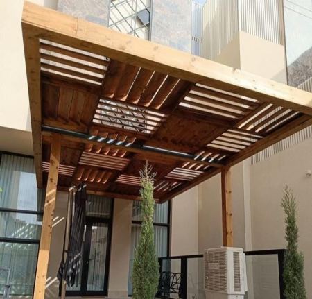 تكلفة مظلات خشبية للمدخل في مكة 